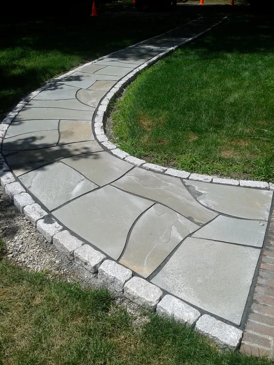 Landscaped stairs, walls, and pathways by Rock Solid Solutions - Photo 38
