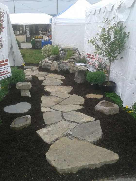 Landscaped stairs, walls, and pathways by Rock Solid Solutions - Photo 33