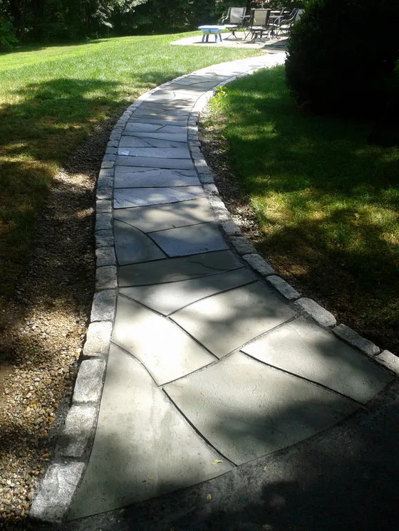 Landscaped stairs, walls, and pathways by Rock Solid Solutions - Photo 31