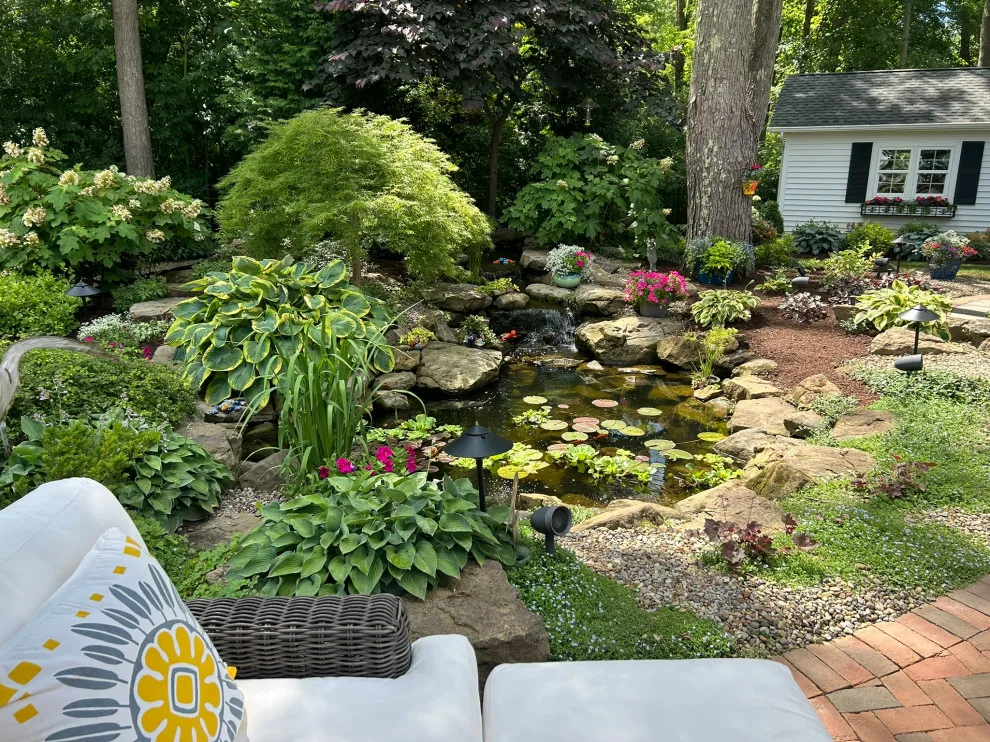 Hudson Backyard Oasis with Pool by Land Creations Landscaping Inc. - Photo 4