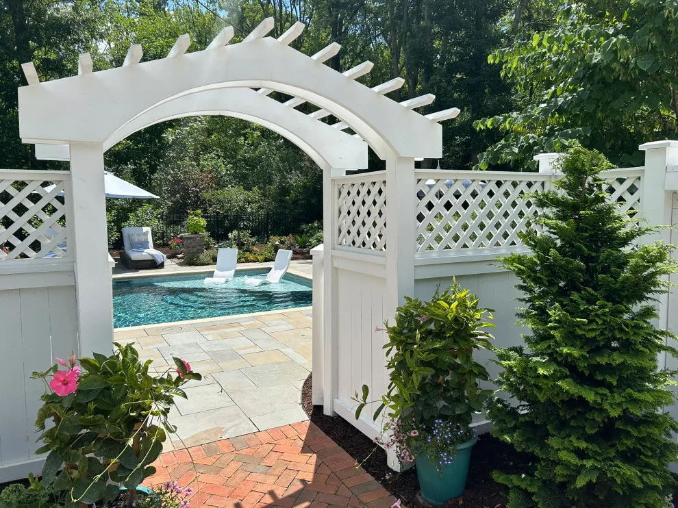 Hudson Backyard Oasis with Pool by Land Creations Landscaping Inc. - Photo 10