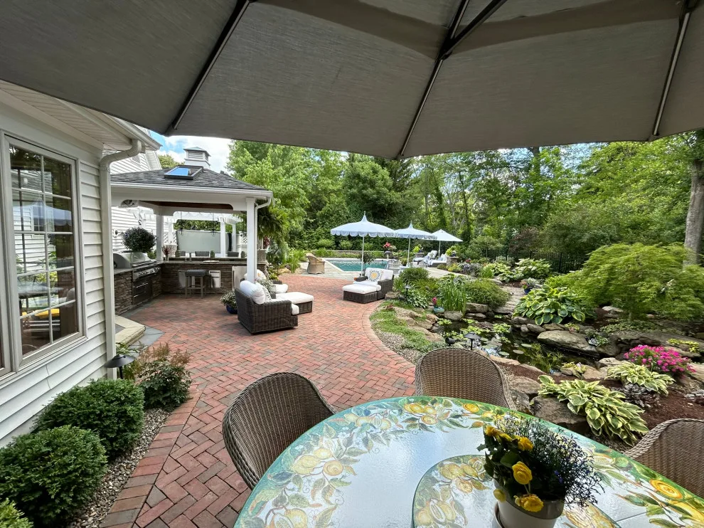 Hudson Backyard Oasis with Pool by Land Creations Landscaping Inc. - Photo 3