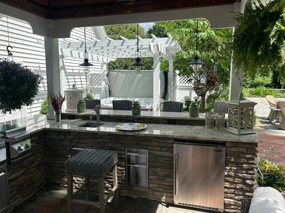 Hudson Backyard Oasis with Pool by Land Creations Landscaping Inc. - Photo 2