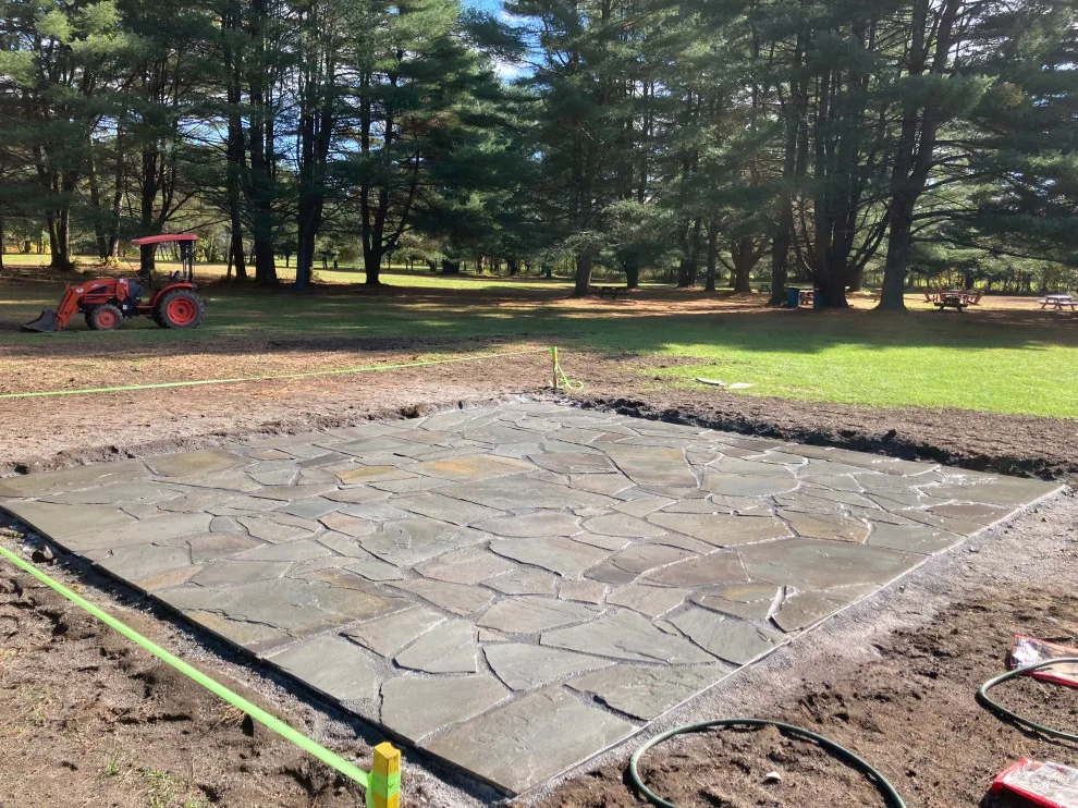 Uneven bluestone terrace by Legacy Masonry & Hardscaping - Photo 4