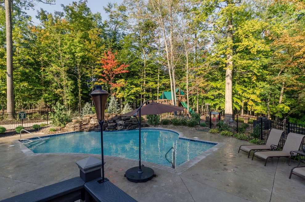 Backyard Renovation: Pool, Patio, Kitchen, Firepit & Golf by The Ohio Valley Group, INC. - Photo 3