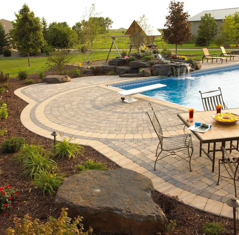 Versatile Poolside: Paver Patio with Fire Pit and Seating Areas by Anchor Block Company - Photo 3
