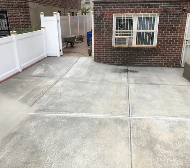 Fresh Concrete Driveway by First Responders Construction, Inc. - Photo 3