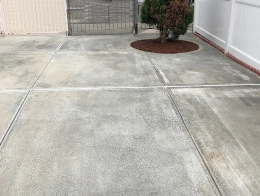 Fresh Concrete Driveway by First Responders Construction, Inc. - Photo 7