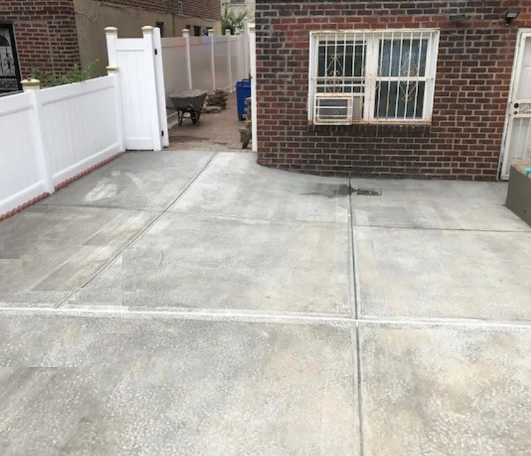 Fresh Concrete Driveway by First Responders Construction, Inc. - Photo 2