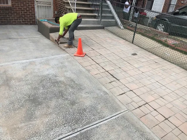 Fresh Concrete Driveway by First Responders Construction, Inc. - Photo 4