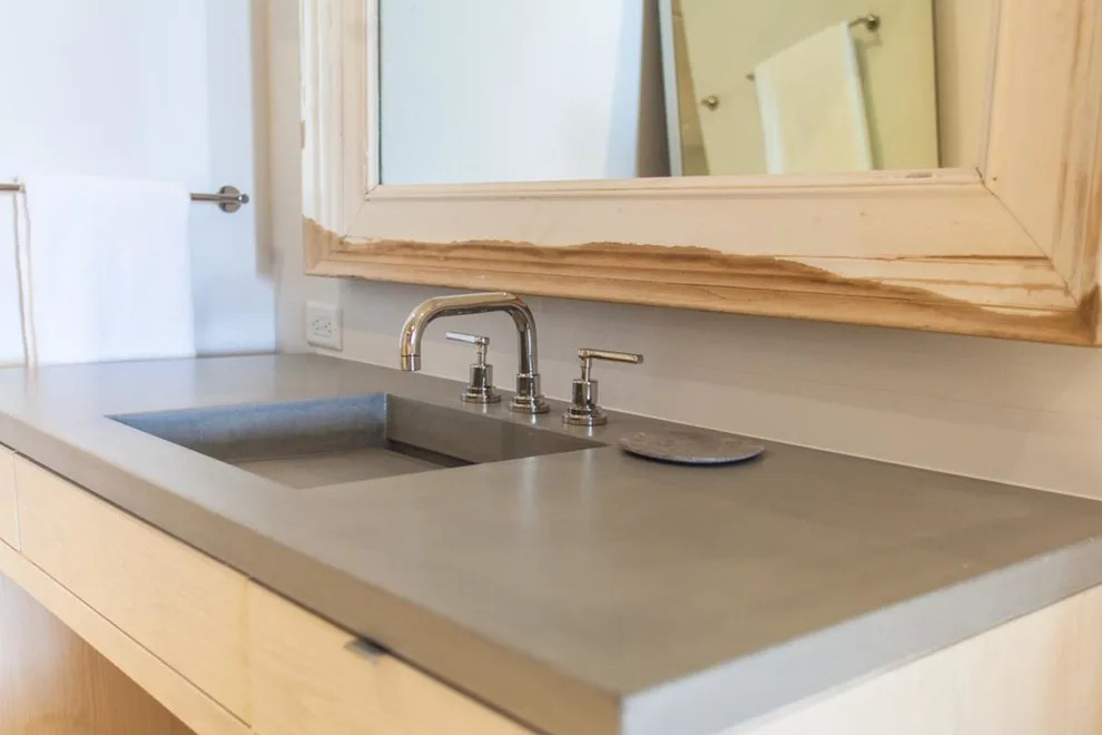 Coastal Condominium Bathroom Featuring Concrete Shower and Vanities by Thiel Studios - Photo 4