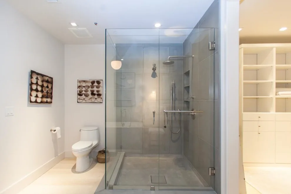 Coastal Condominium Bathroom Featuring Concrete Shower and Vanities by Thiel Studios - Photo 3