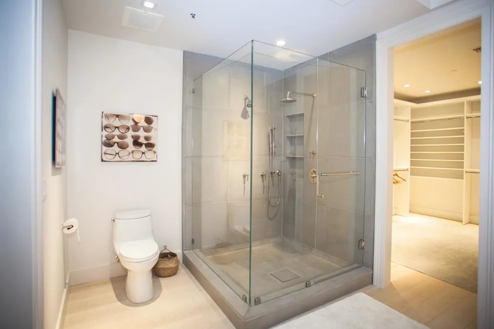 Coastal Condominium Bathroom Featuring Concrete Shower and Vanities by Thiel Studios - Photo 5