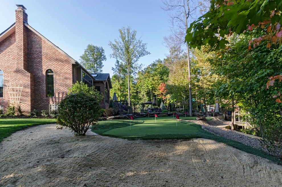 Backyard Renovation: Pool, Patio, Kitchen, Firepit & Golf by The Ohio Valley Group, INC. - Photo 9