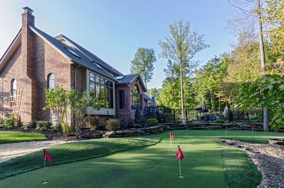 Backyard Renovation: Pool, Patio, Kitchen, Firepit & Golf by The Ohio Valley Group, INC. - Photo 5