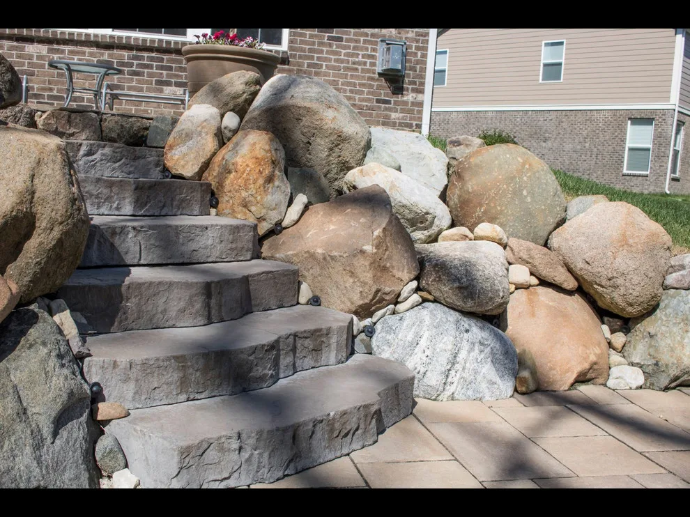 Outdoor Seating and Stone Barriers by Denali Exterior Design - Photo 5