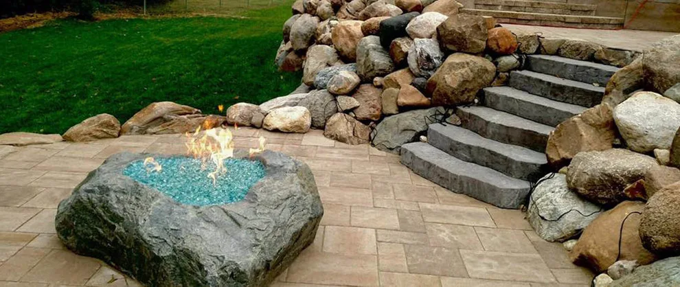Outdoor Seating and Stone Barriers by Denali Exterior Design - Photo 3