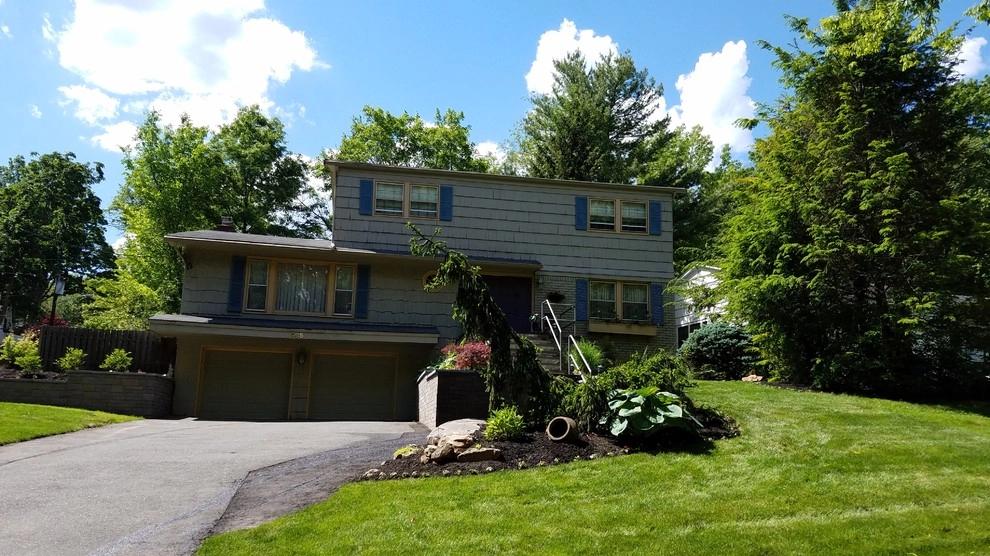Front Foundation Plantings by The Slevin Group Landscape & Snow - Photo 4
