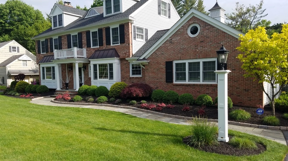 Front Foundation Plantings by The Slevin Group Landscape & Snow - Photo 6