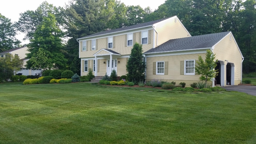 Front Foundation Plantings by The Slevin Group Landscape & Snow - Photo 8