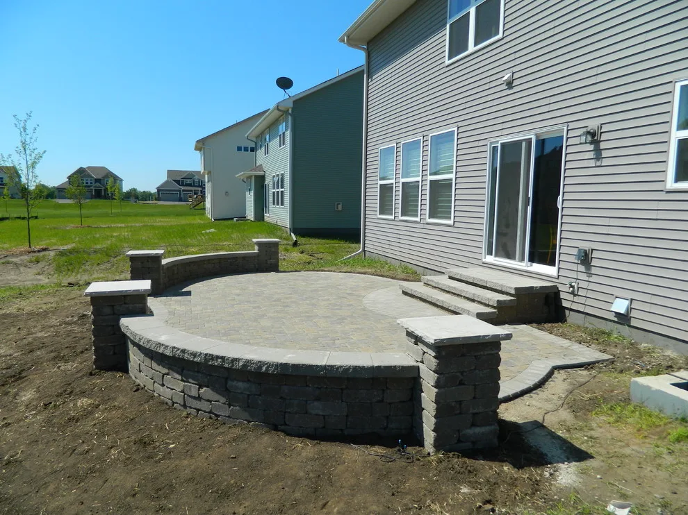Paver Patio Featuring Seat Walls and Steps by Devine Design Hardscapes - Photo 4