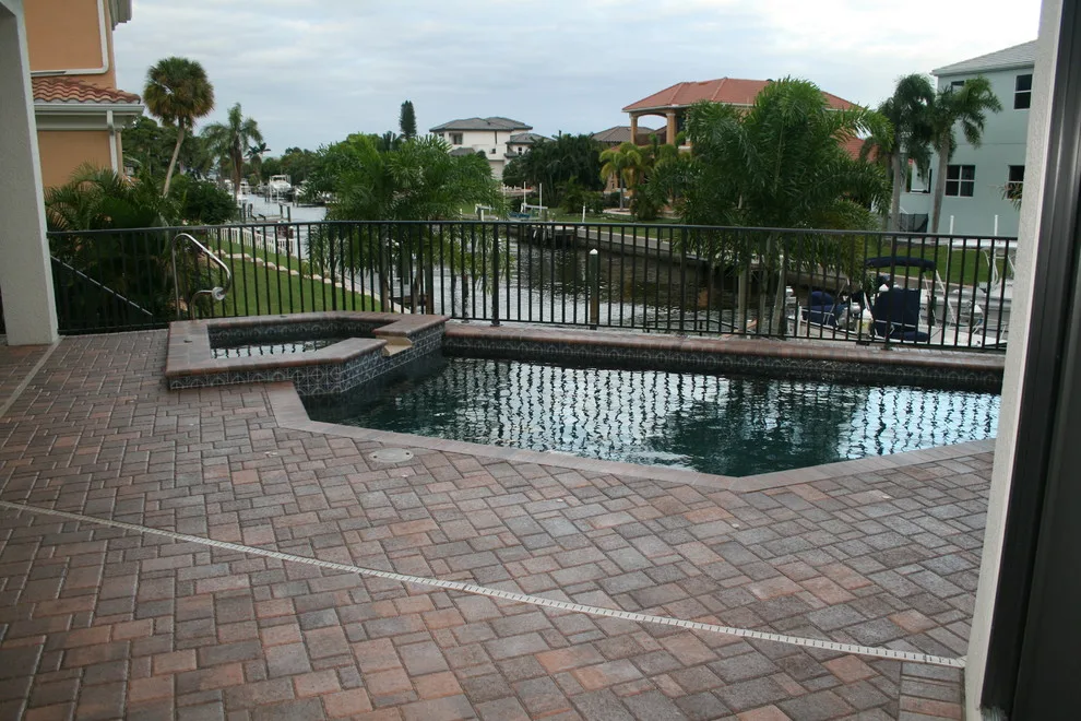 Swimming Area Patios by Island Exteriors, LLC - Photo 5