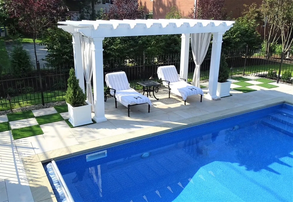Checkerboard Turf Pool Project with Stone Patio by Land Creations Landscaping Inc. - Photo 6