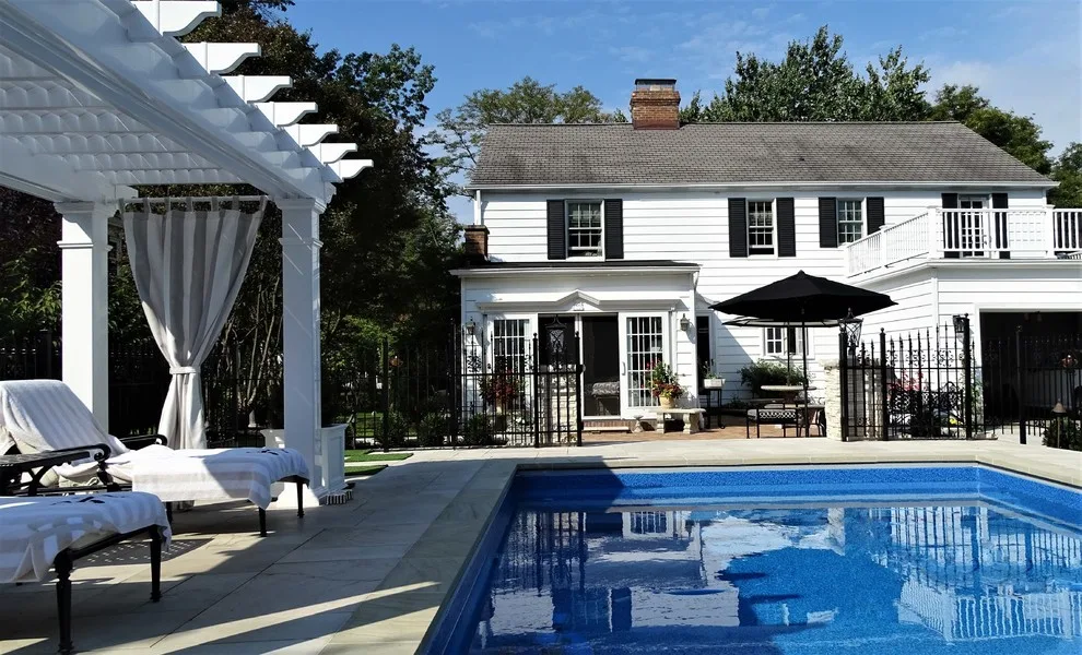 Checkerboard Turf Pool Project with Stone Patio by Land Creations Landscaping Inc. - Photo 7
