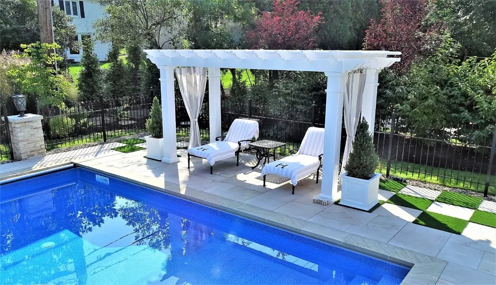 Checkerboard Turf Pool Project with Stone Patio by Land Creations Landscaping Inc. - Photo 3