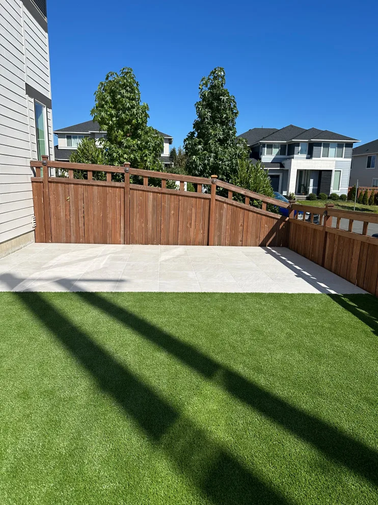 Ceramic tiles and synthetic grass by Xavier Pavers - Photo 5