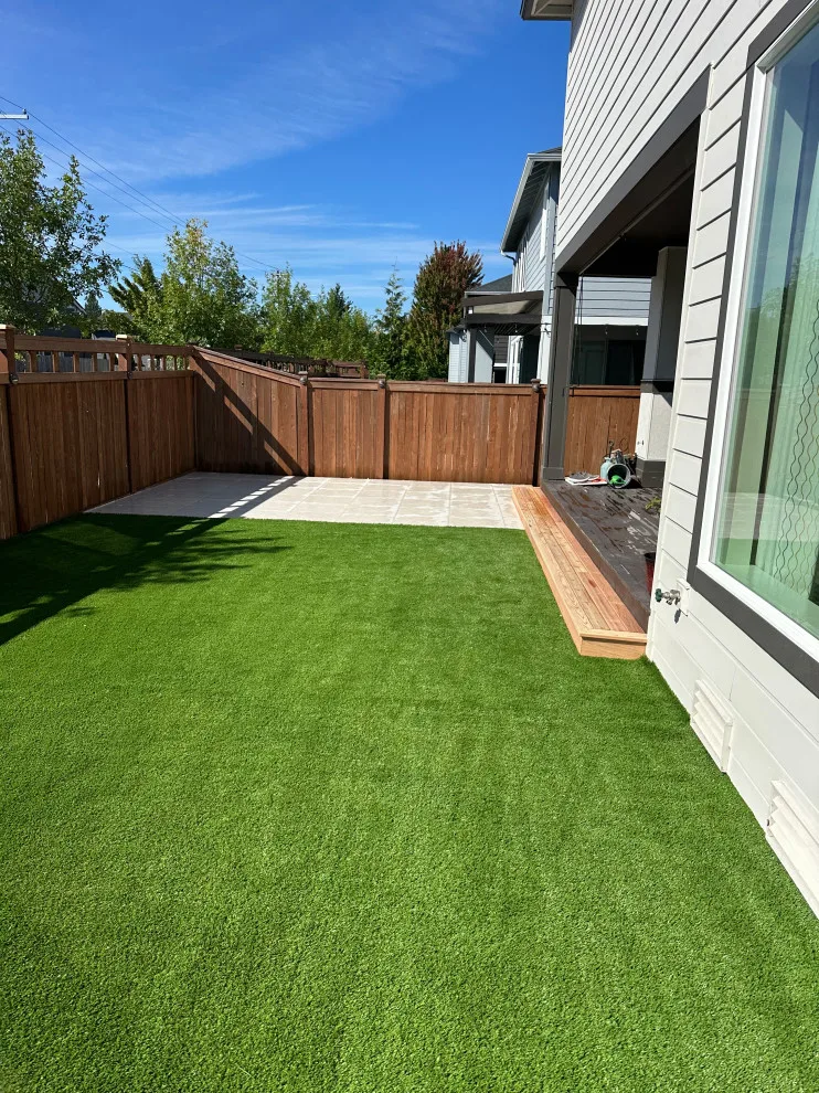 Ceramic tiles and synthetic grass by Xavier Pavers - Photo 6