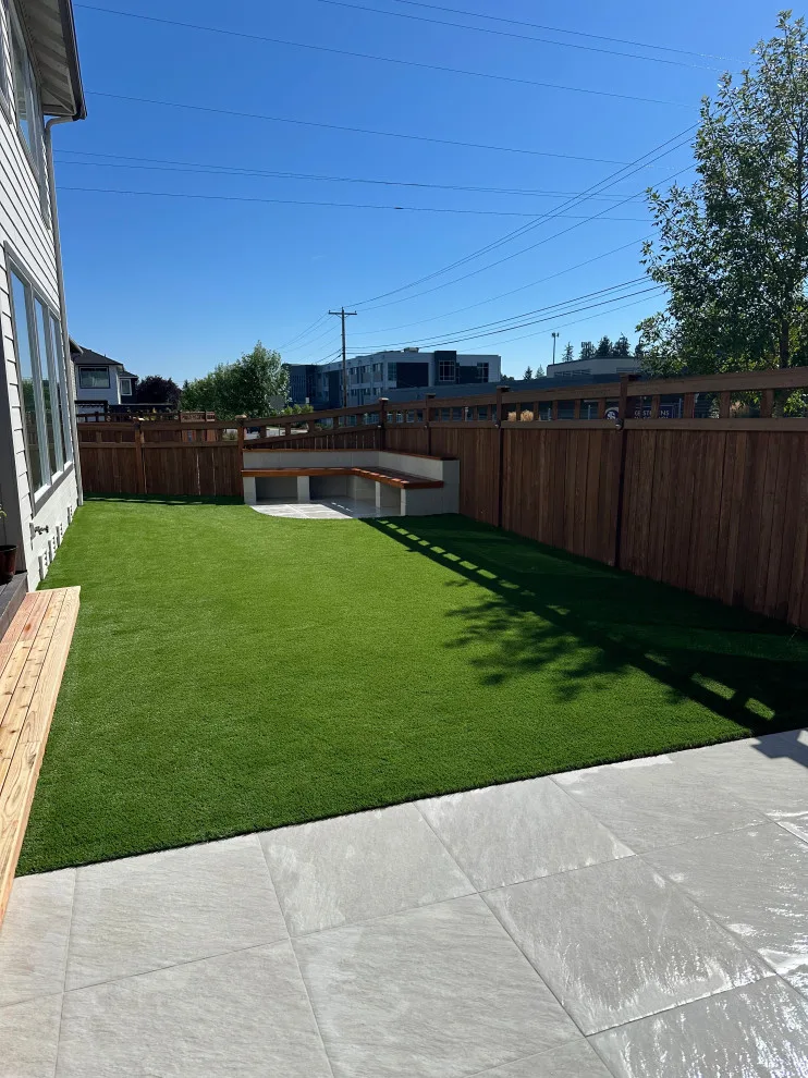 Ceramic tiles and synthetic grass by Xavier Pavers - Photo 3