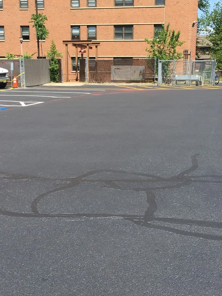 Seal Coating Initiatives by Rusling Paving & Concrete - Photo 9