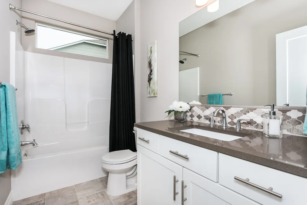 Gray Residence 916 Ledgestone by Design Group Architects Ltd. - Photo 21
