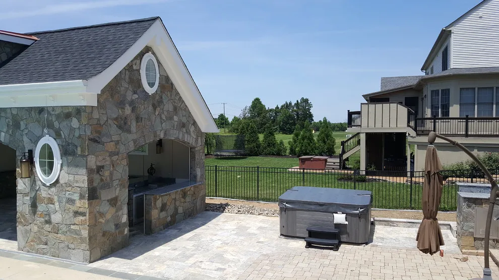 Backyard Oasis with Kitchen and Pool House by Premier Home Services, Inc - Photo 9