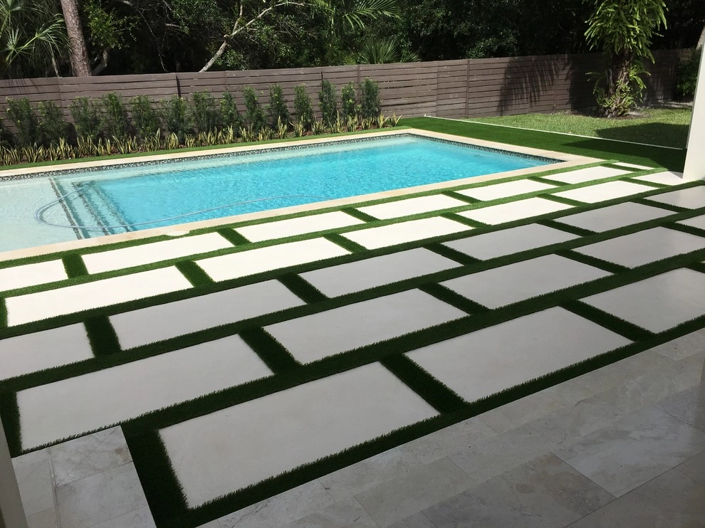 Baptist area backyard pool area by Tropical Turf - Photo 3