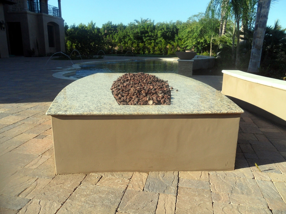 Outdoor Living Space with Kitchen and BBQ by Ocean Blue Pools And Landscaping - Photo 6
