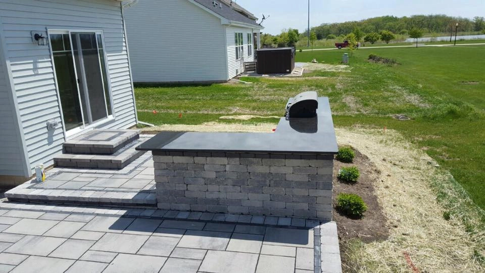 Patio + Bar and Grill Project by Vidal Landscaping & Snow Plowing - Photo 5
