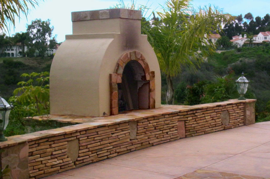 Outdoor Living Space with Kitchen and BBQ by Ocean Blue Pools And Landscaping - Photo 19