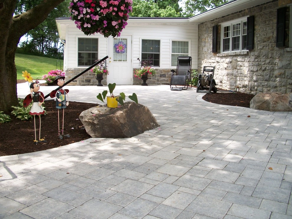 A Shaded Backyard Patio by Weavers Landscape Company - Photo 14