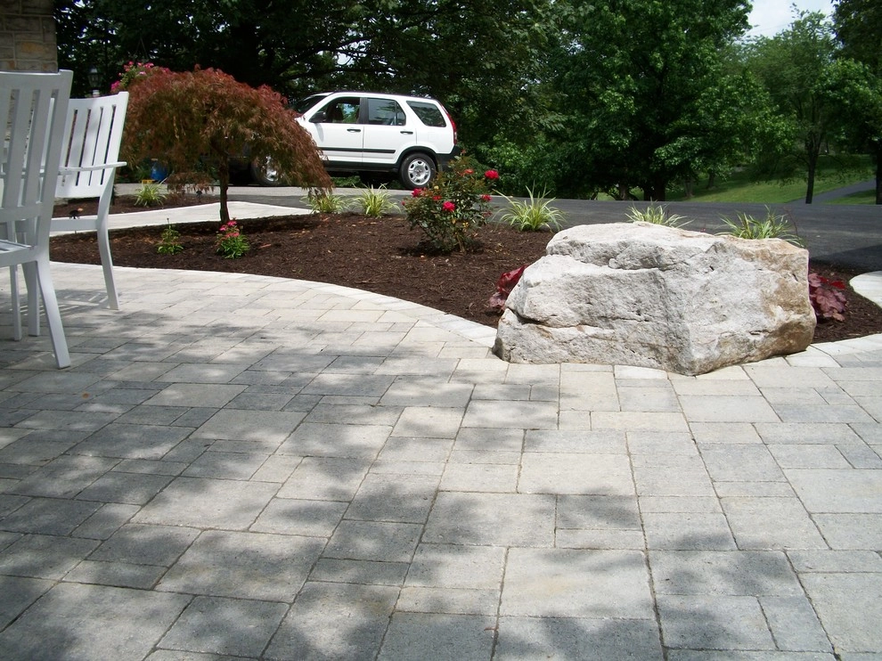 A Shaded Backyard Patio by Weavers Landscape Company - Photo 10
