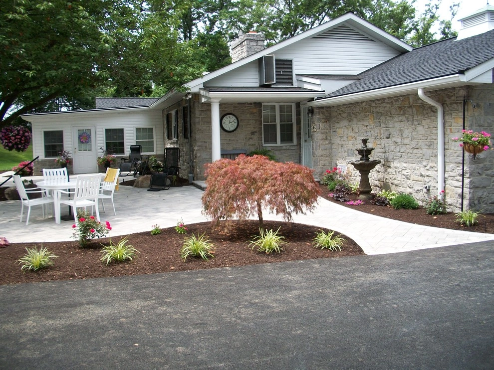 A Shaded Backyard Patio by Weavers Landscape Company - Photo 8