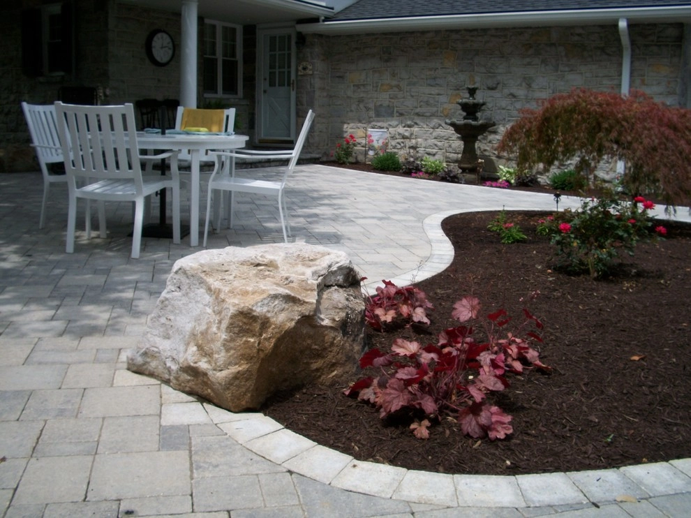 A Shaded Backyard Patio by Weavers Landscape Company - Photo 2