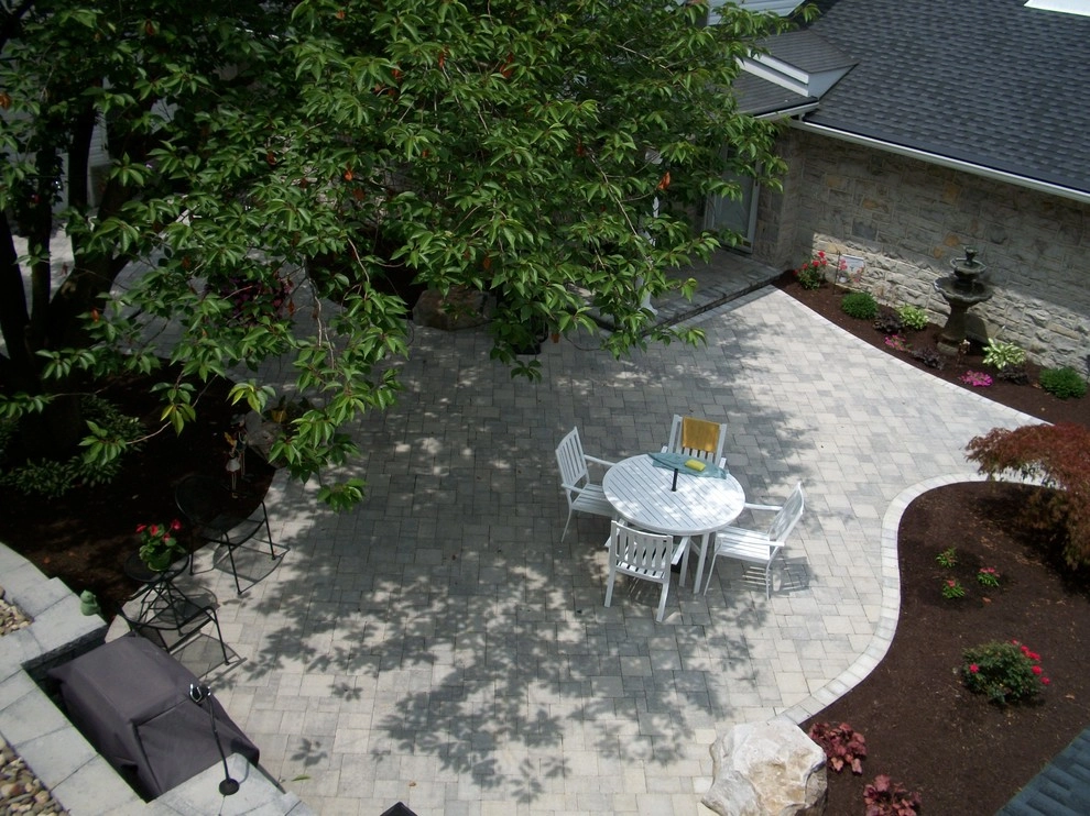 A Shaded Backyard Patio by Weavers Landscape Company - Photo 15