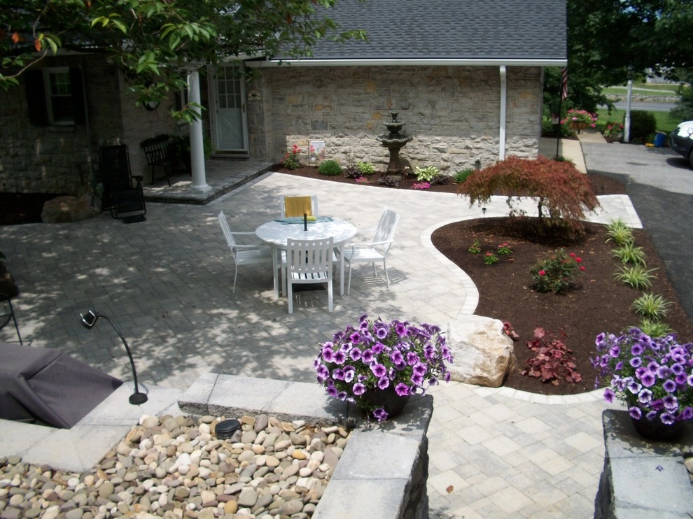 A Shaded Backyard Patio by Weavers Landscape Company - Photo 4