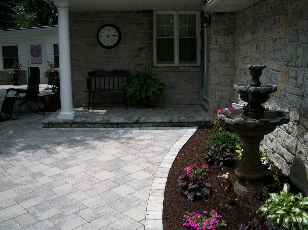 A Shaded Backyard Patio by Weavers Landscape Company - Photo 5