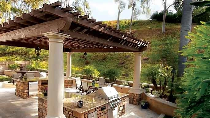 Outdoor Living Space with Kitchen and BBQ by Ocean Blue Pools And Landscaping - Photo 20