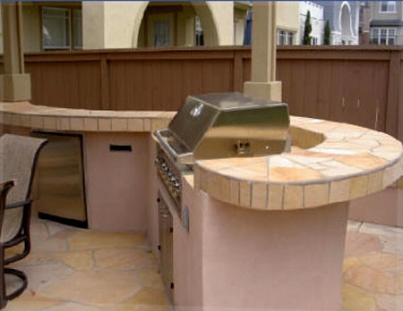 Outdoor Living Space with Kitchen and BBQ by Ocean Blue Pools And Landscaping - Photo 7