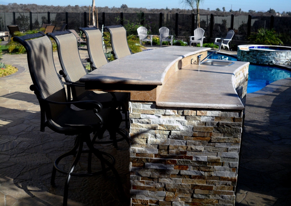 Outdoor Living Space with Kitchen and BBQ by Ocean Blue Pools And Landscaping - Photo 5