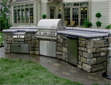 Outdoor Living Space with Kitchen and BBQ by Ocean Blue Pools And Landscaping - Photo 15